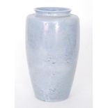 A large Ruskin Pottery vase of high shouldered form decorated in a mottled lavender glaze with