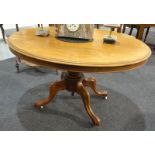 A Victorian walnut oval loo table,