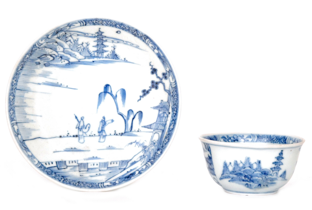 An 18th Century blue and white teabowl and saucer from the Ca Mau - Binn Thuan cargo decorated with