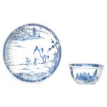 An 18th Century blue and white teabowl and saucer from the Ca Mau - Binn Thuan cargo decorated with