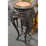 An Oriental Export hardwood jardiniere stand,