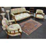 An Edwardian line inlaid mahogany three piece salon suite, with rosewood marquetry inlaid panels,