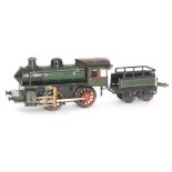 A Karl Bubb 0-4-0 locomotive and tender 0-35 and a modern French Hornby O gauge Hachette locomotive