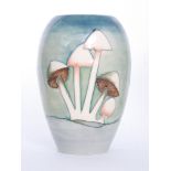 A Moorcroft Pottery vase decorated in the Fairy Ring pattern designed by Phillip Richardson