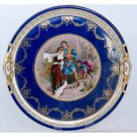 A late 19th to early 20th Century Continental twin handled tray transfer decorated to the centre