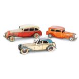 A Mettoy orange painted sedan car, length 23cm,