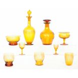 A collection of early 20th Century tableware to comprise two decanters, water jug, water glasses,