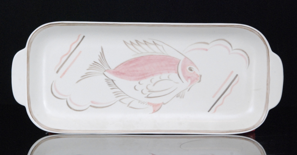 A 1950s Poole Pottery rectangular sandwich plate decorated with a hand painted pink fish,