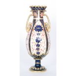 A Royal Crown Derby twin handled vase decorated in the Imari 1128,