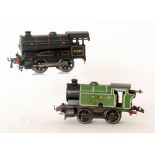 A Hornby O gauge 0-4-0 tank locomotive 60199 in black livery and a 0-4-0 LNER locomotive in green