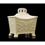 A late 19th Century Sowerby Queens Ivory pressed glass miniature tea caddy in the Aesthetic taste