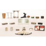 A collection of papier mache, plated and other snuff bottles, also knife rests,