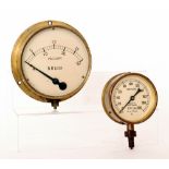 A BR brass pressure gauge, a vacuum gauge, two circular signal deflectors,