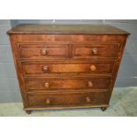 A George III oak and mahogany straight front chest of two short and three long drawers,