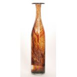 A large Mdina attenuated bottle vase with tall drawn neck and flat collar rim with internal tonal