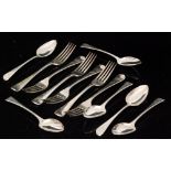 A hallmarked silver set of six table forks with a set of six dessert spoons, total weight 18oz,