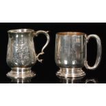 A Georgian hallmarked silver baluster half pint tankard with later foliate engraved decoration,