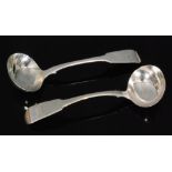 A pair of George III hallmarked silver fiddle pattern sauce ladles of plain form,