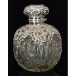 An early 20th Century hallmarked silver and glass globular scent bottle,