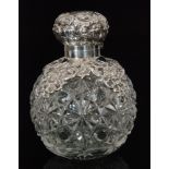 An early 20th Century hallmarked silver and glass globular scent bottle,