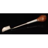 A modern hallmarked silver stilton scoop with turned wooden handle,