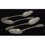 A set of four William IV hallmarked silver fiddle pattern table spoons, weight 7.5oz, London 1833.