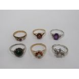 A collection of five gold and silver Rings, set with amethyst, rubies, opals, garnets etc.