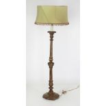 A giltwood Lamp Standard and shade, with turned and fluted upright, on circular base.