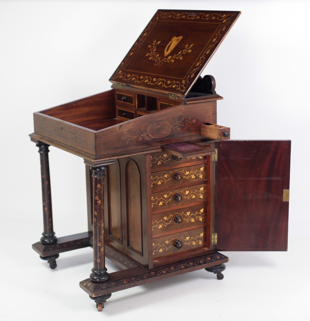 A very fine and important early 19th Century Killarney wood arbutus and marquetry Davenport Desk,