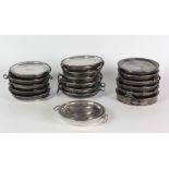 A collection of 18 Victorian silver plated Plate Warmers, with drop handles, each approx.