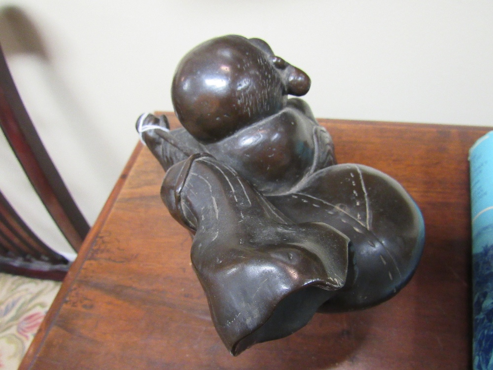 A heavy 19th Century Japanese bronze Figure of rotund Japanese Man, Hotri, seated with a backpack, - Image 5 of 7