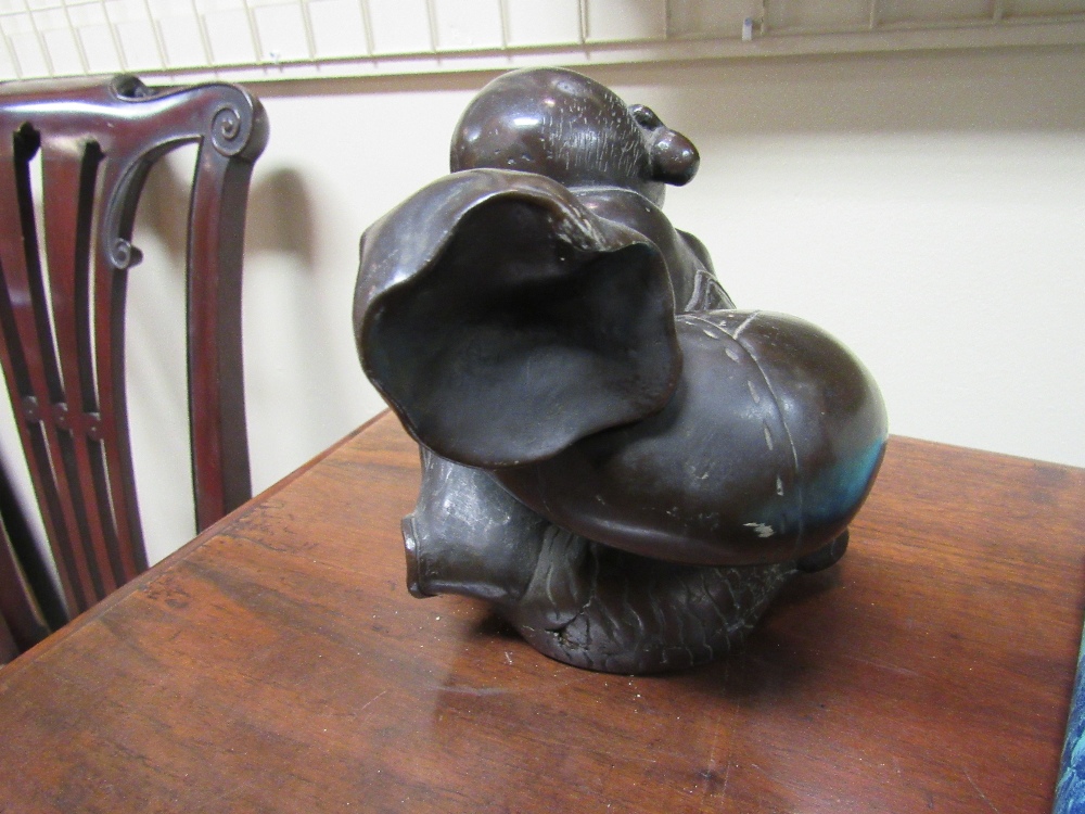 A heavy 19th Century Japanese bronze Figure of rotund Japanese Man, Hotri, seated with a backpack, - Image 4 of 7