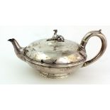 A heavy Victorian plain silver Teapot, of bulbous form, London c. 1879, possibly by J.