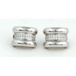 A fine unusual pair of 'Chopard La Strada' Ear Rings, set in 18ct white gold with 44 diamonds (.