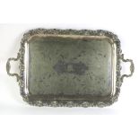 A large 19th Century silver plated two handled Tray, with engraved body with central monogram,