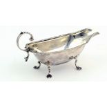 A small unusual English silver Cream Jug, with gadroon edge,