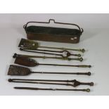 A collection of 19th Century steel and brass Fire Irons,