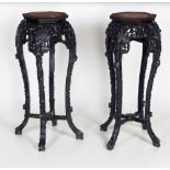 A pair of attractive 19th Century ebonised Chinese Jardiniere Stands,