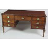 A late George III period mahogany knee-hole Writing Desk,