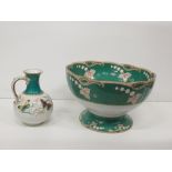 A hand painted butterfly Jug, together with a large green ground Punch Bowl on circular base.