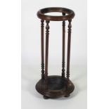 A Victorian mahogany cylindrical Open Stick & Umbrella Stand, with turned pillar supports.