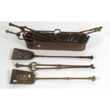 A collection of 19th Century steel and brass Fire Irons,