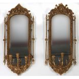 A pair of 19th Century upright giltwood three branch Girandoles,