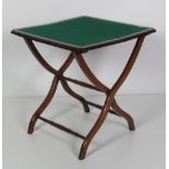 A 19th Century mahogany folding "Coaching" Table, with baize top,