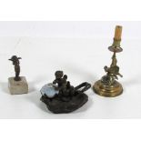 A small attractive Art Nouveau bronze Desk Oil Lamp, modelled with a cherub on a leaf,