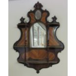 An attractive French rococo style kingswood and brass mounted Wall Bracket, with mirror back.