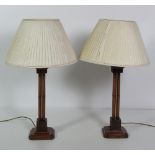A pair of Chinese Chippendale style cluster column Lamps, with shades.
