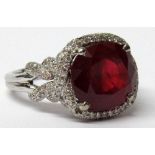 An important and attractive Ring, with extremely large natural ruby stone (approx. 9.