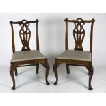 A rare pair of early 19th Century carved Irish walnut Side Chairs, in the Chippendale style,