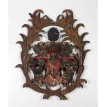 An important early 18th Century German carved giltwood and polychrome painted Coat of Arms Cresting,